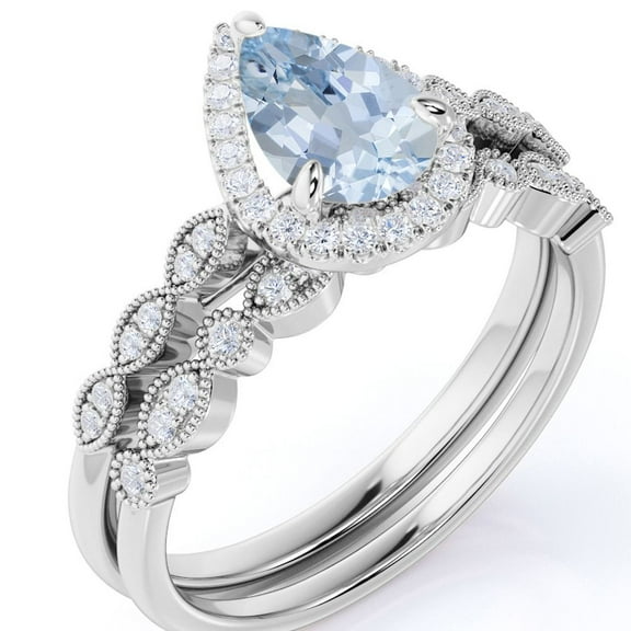JeenMata Antique 1.5 carat Pear Shaped Created Aquamarine and Moissanite Bridal Ring Set in 18k White Gold over Silver