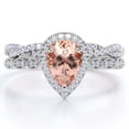 thumbnail image 1 of JeenMata Art Deco Filigree Milgrain - 1.5 Carat Almond Shaped Peach created morganite and Moissanite - Halo Pave Crossover Wedding Set - 18K White Gold Plating over Silver, 1 of 6