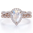thumbnail image 1 of JeenMata Art Deco Filigree Milgrain - 1.5 Carat Pear Shaped Rainbow Moonstone and Moissanite - Halo Pave Crossover Wedding Set - 18K Rose Gold Plating over Silver, 1 of 6