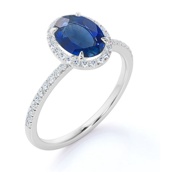 JeenMata Classic Halo Design 1.50 TCW Oval Cut Lab-Created Blue Sapphire and Moissanite Pave Accented Engagement Ring in 18K White Gold Plating over Silver