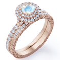 thumbnail image 1 of JeenMata Edwardian Band - 1.75 Carat Round Shape Blue Moonstone and Moissanite - Pave Double Halo Wedding Ring Set - 18K Rose Gold Plating over Silver, 1 of 6