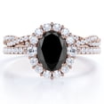 thumbnail image 1 of JeenMata Halo Cluster - 1.5 Carat Egg Shaped Lab Created Black Diamond and Moissanite - Pave Crossover Bridal Set - 18K Rose Gold Plating over Silver, 1 of 7