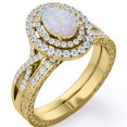 thumbnail image 1 of JeenMata Infinity Shank 1.5 Carat Egg-Shaped White Fire Opal and Moissanite Pave Duo Halo Victorian Bridal Set in 18K Yellow Gold Plating over Silver, 1 of 6