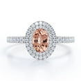 thumbnail image 1 of JeenMata Pave Accented Band 1.75 Carat Ovate created morganite and Moissanite Double Halo Engagement Ring in 18K White Gold Plating over Silver, 1 of 6