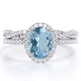 thumbnail image 1 of JeenMata Pave Halo Setting 1.75 Carat Oval Cut Light Blue Created Aquamarine And Moissanite Infinity Twisted Shank Bridal Set in 18K White Gold Plating over Silver, 1 of 6