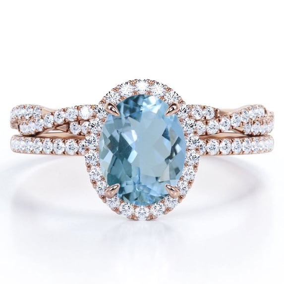 JeenMata Pave Halo Setting 1.75 Carat Oval Cut Light Blue Created Aquamarine And Moissanite Infinity Twisted Shank Bridal Set in 18K Rose Gold Plating over Silver