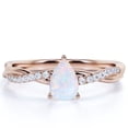 thumbnail image 1 of JeenMata Triple Prong Cathedral - 1.75 Carat Pear Cut Opal And Moissanite - Semi Pave Twisted Infinity Engagement Ring - 18K Rose Gold Plating Over Silver, 1 of 7