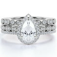 thumbnail image 1 of JeenMata Unique 1.75 Carat Pear Cut Moissanite Wedding Trio Ring Set with Engagement Ring and 2 Wedding Bands in 18k Gold Over Silver, 1 of 7