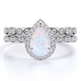 thumbnail image 1 of JeenMata Vintage 1.5 Carat Pear Cut Opal and Moissanite Wedding Ring Set in 18K White Gold over Silver, 1 of 7