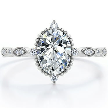 JeenMata Vintage Filigree Bezel 1.5 Carat Oval Shape Moissanite 5-Stone Milgrain Decorative Engagement Ring In 18K White Gold Plating Over Silver