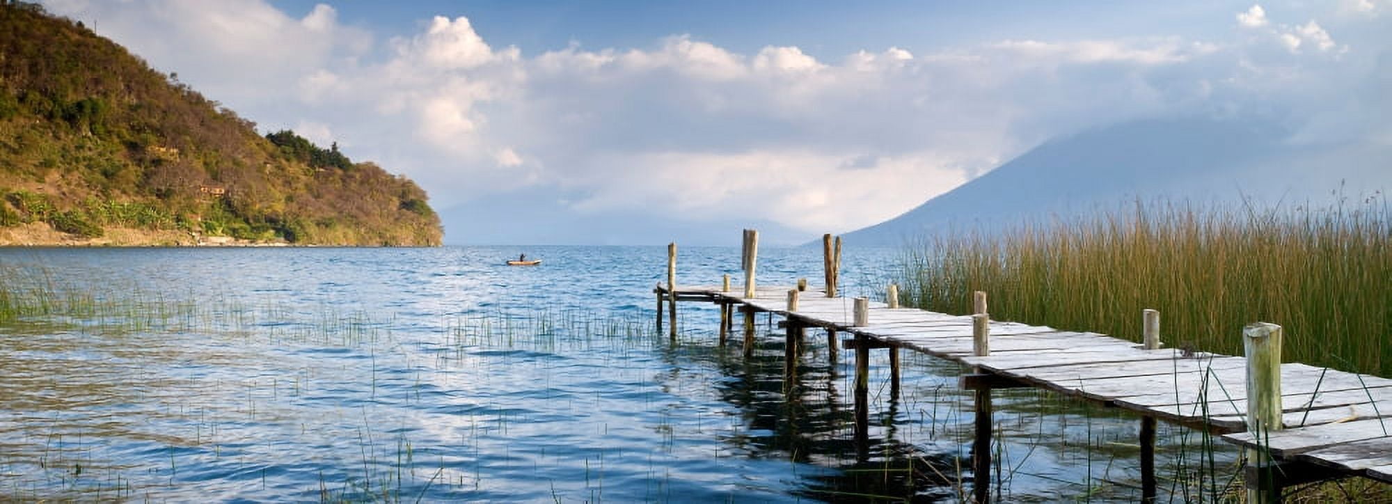 Jetty in a lake with a mountain range in the background Lake Atitlan San Marcos Western Highlands Guatemala Canvas Art - Panoramic Images (27 x 9)