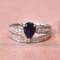 thumbnail image 1 of Jewelerix 925 Sterling Silver Pear Cut Blue Sapphire Simulated Engagement Ring for Women – 2.5 Ct Split Shank Band with Round Accent Stones, 1 of 9