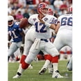 thumbnail image 1 of Jim Kelly Buffalo Bills Unsigned Set to Pass Photograph, 1 of 1