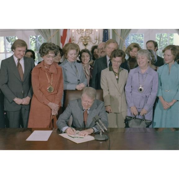 Jimmy Carter Signs A House Of Representatives Resolution To Extend The Deadline For State Ratification Of The For Equal Rights Amendment From 1979 To 1982. At Carter'S Left Is Representative Elizabeth