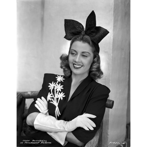 Joan Blondell on an Embroidered Top and sitting Photo Print (24 x 30)