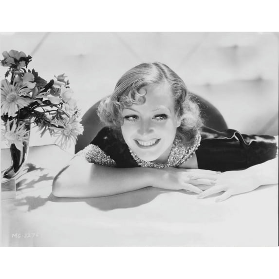 Joan Crawford leaning on a table Photo Print (24 x 30)