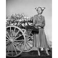 thumbnail image 1 of Joan Fontaine Glamour Outfited Standing In Flowery Hat By Flower Cart 24x36 Classic Hollywood Poster, 1 of 1