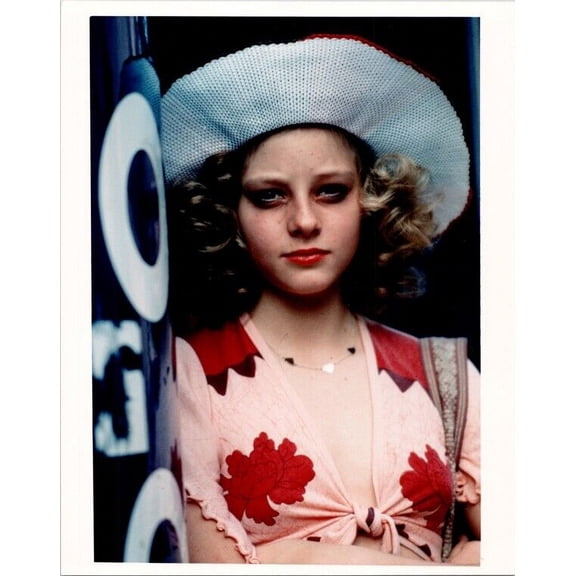 Jodie Foster as Iris wearing hat stands in doorway Taxi Driver 8x10 inch photo