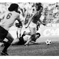 thumbnail image 1 of Johan Cruyff (1947- ). /Ndutch Soccer Player. Cruyff Runs Through Uruguay'S Defense During The 1974 World Cup, Held In West Germany. Poster Print by  (18 x 24), 1 of 1