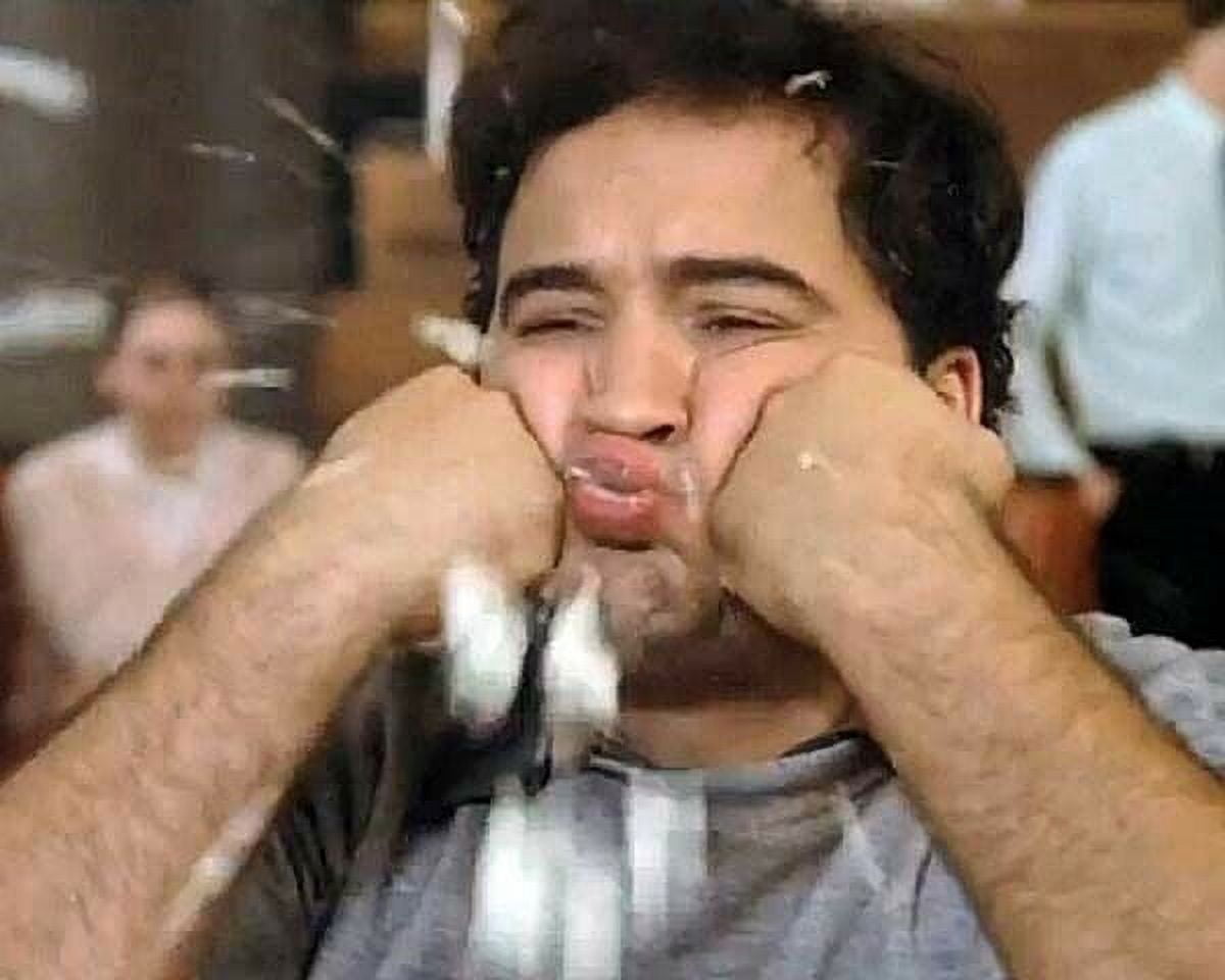 John Belushi in zit scene spits out food from Animal House 8x10 inch