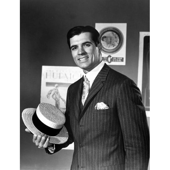 John Gavin holding a straw hat Photo Print (24 x 30)