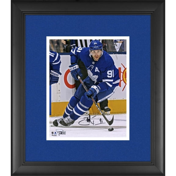 John Tavares Toronto Maple Leafs Framed Autographed 8" x 10" Blue Jersey Skating with Puck Photograph - Fanatics Authentic Certified
