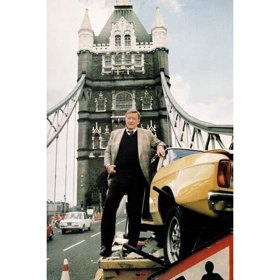 John Wayne poses by Ford Capri on London's Tower Bridge Brannigan 24x36 poster