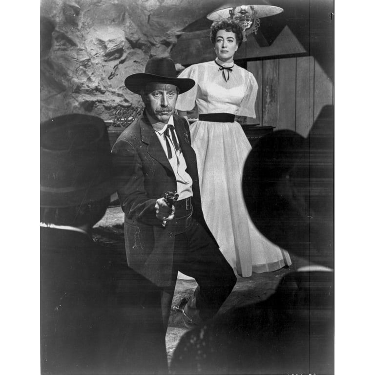 Johnny Guitar Man Pointing a Gun in Black Suit with Woman in White