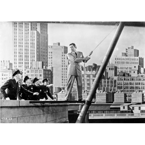 Johnny Weissmuller Attempting to Jump in Black and White Photo Print (8 x 10)