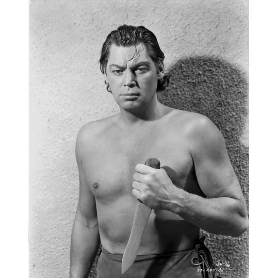 Johnny Weissmuller Holding a Knife in a Classic Movie Scene Photo Print (8 x 10)