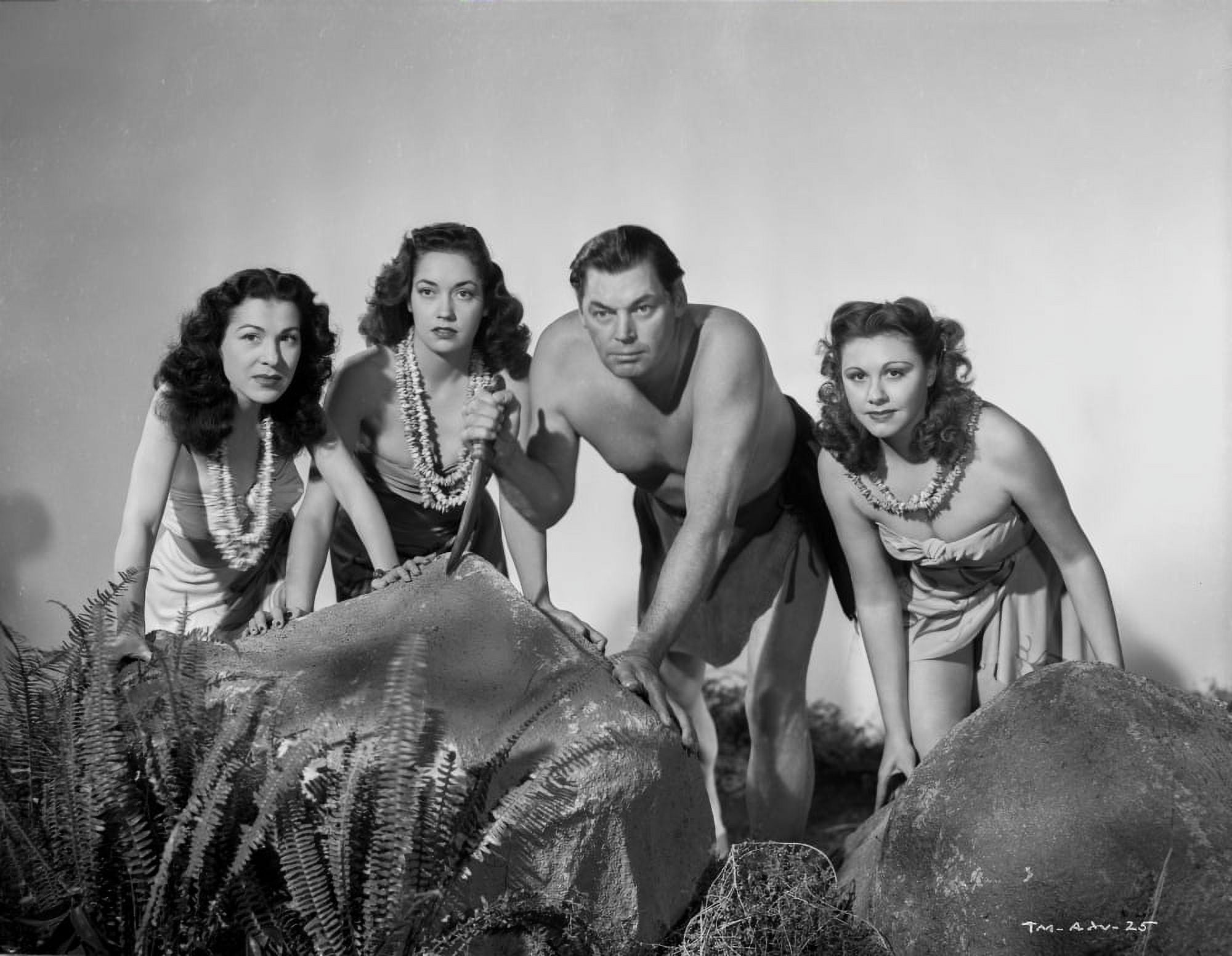 Johnny Weissmuller Kneeling on the Ground with Three Woman in a Classic