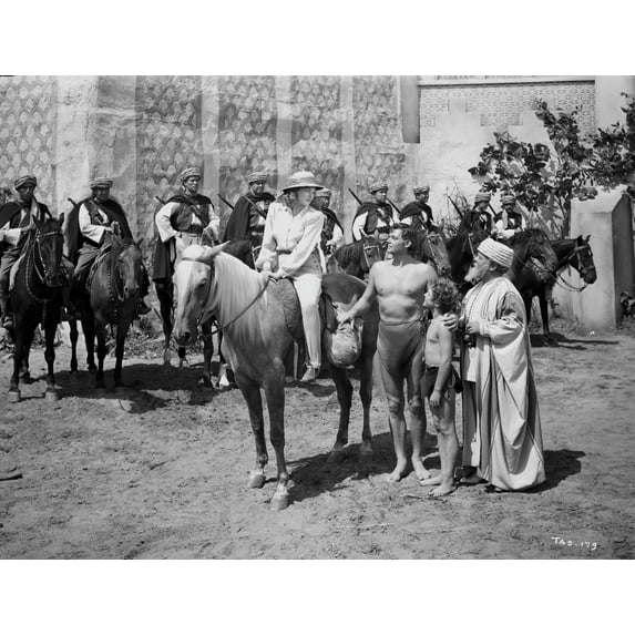 Johnny Weissmuller Saying Goodbye to a Woman Riding a Horse in a Classic Movie Scene Photo Print (8 x 10)