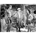 thumbnail image 1 of Johnny Weissmuller Watching His Girl and a Small Guy Talking in a Movie Scene Photo Print (24 x 30), 1 of 1
