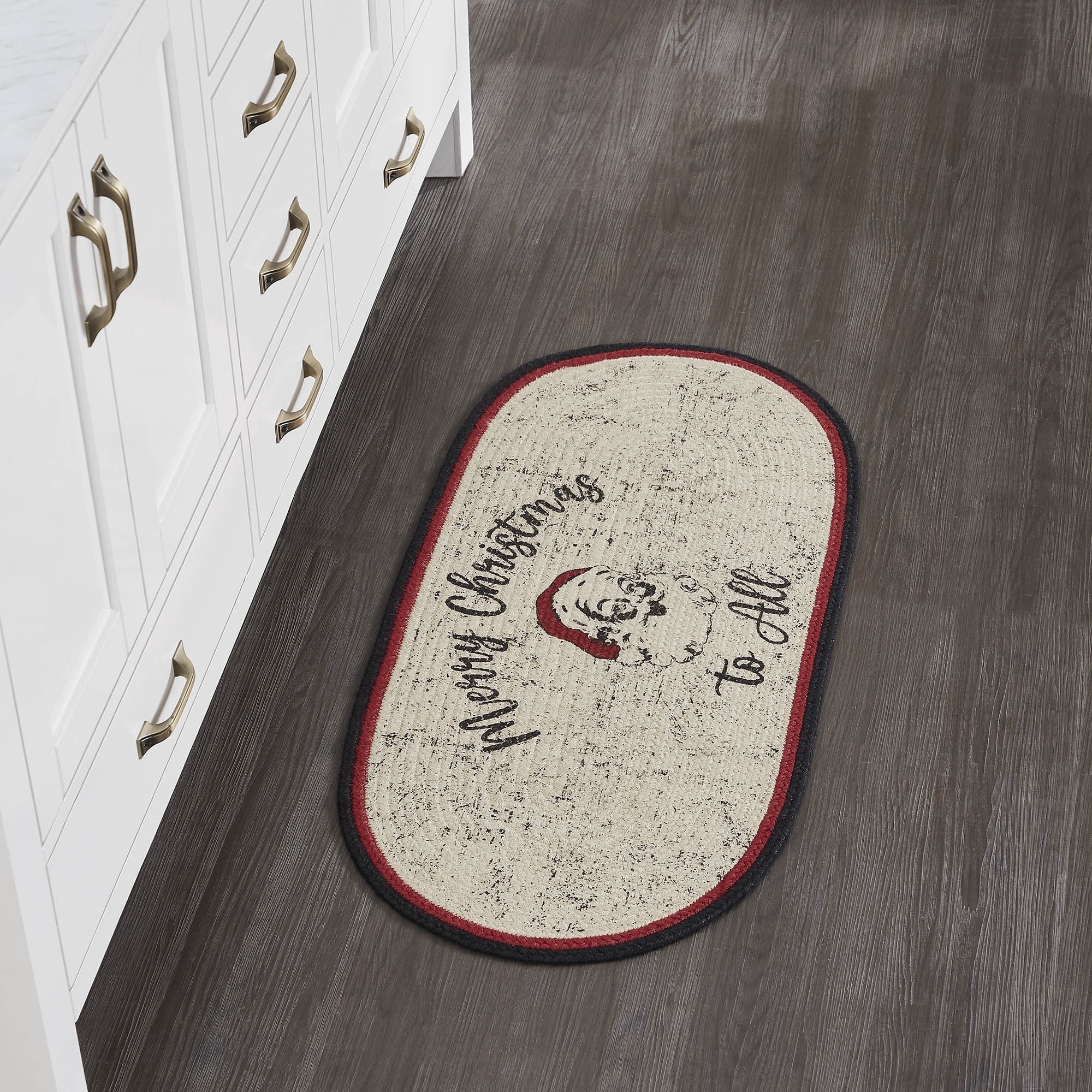 VHC Brands Jolly Ole Santa Farmhouse 17"x36" Merry Christmas to All Accent Rug Red Stenciled Textured Jute Graphic/Print Oval Holiday Decor