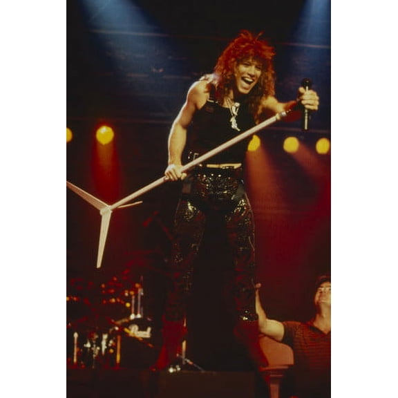 Jon Bon Jovi iconic 1980's pose on stage in concert holding mike stand 24x36 Poster