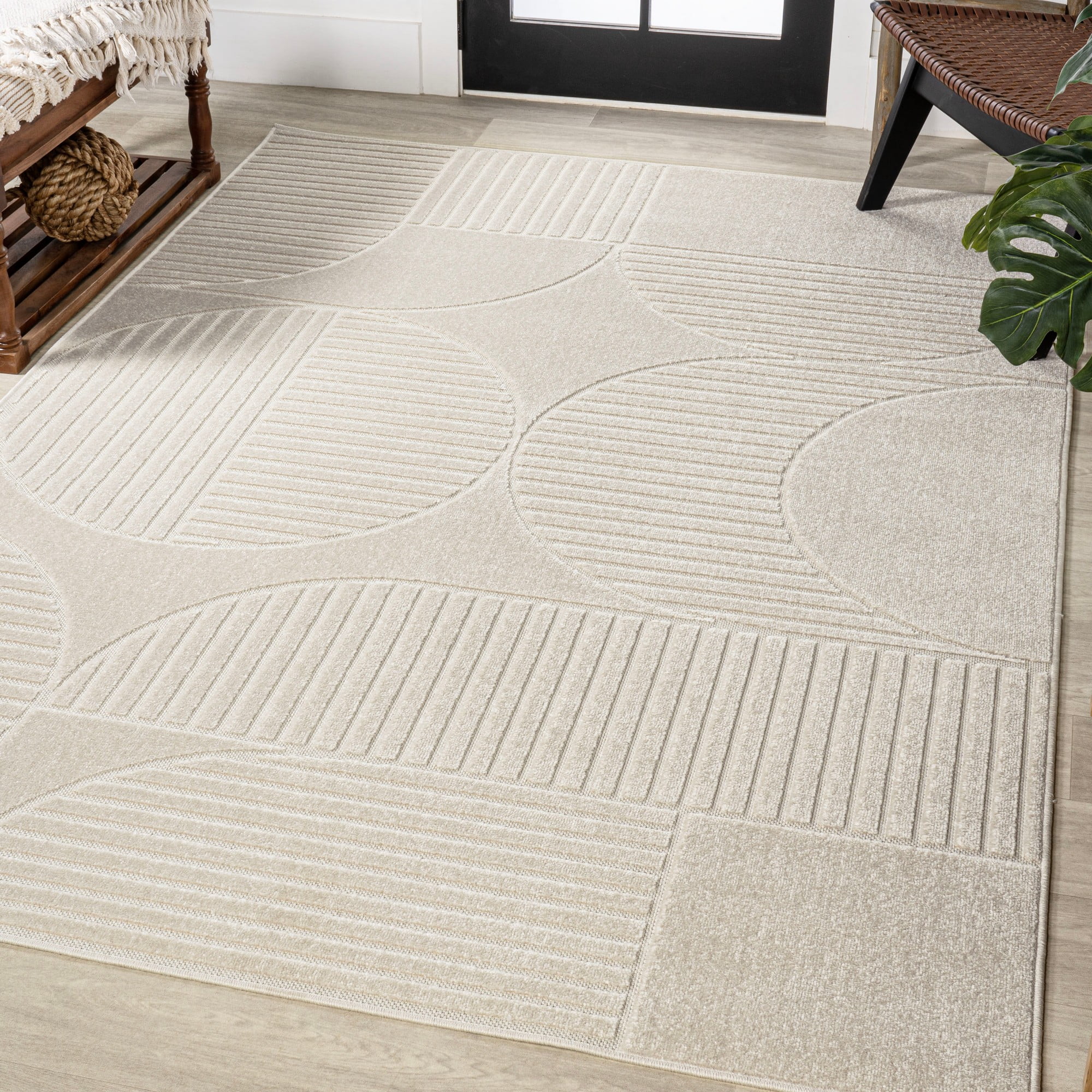 Ivory and Cream Geometric High-Low 8' x 10' Area Rug