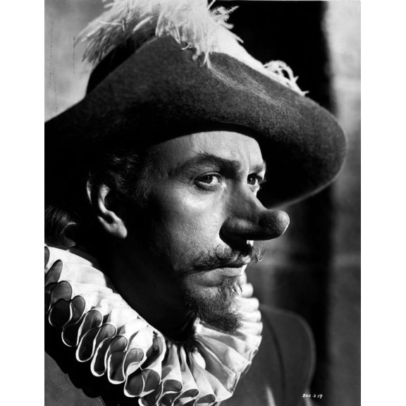 Jose Ferrer wearing a Feather Hat and Exposed His Long Nose in a Close Up Portrait Photo Print (8 x 10)