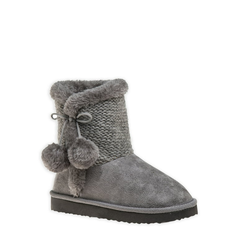 Furry snow boots with pom on sale poms