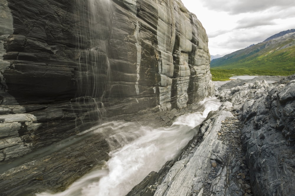 Just below Worthington Glacier water pours down the rock walls it carved Valdez Alaska United States of America Canvas Art - Zachary Sheldon Design Pics (19 x 12)