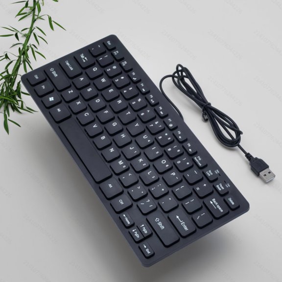 The K1000 Is a Compact Wired USB Mini Keyboard That Is Portable And Designed to Save Space It Features a Plug-And-Play Setup Ergonomic Design And Is Compatible with Both Laptops And Desktop Computers