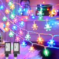 thumbnail image 1 of KOMI 2 Packs 100 LED Christmas Snowflake String Lights, 43 Ft Plug in Fairy Lights 8 Modes with Timer, Waterproof Connectable for Indoor Outdoor Holiday Birthday Wedding Party Xmas Decor Multicolor, 1 of 3