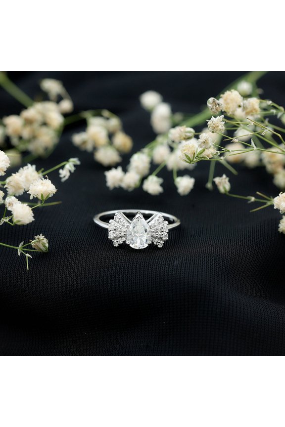 1.2 Ct Pear Cut Moissanite Engagement Ring for Women – Chic 14K White Gold Plated Bow Style with Prong Setting – Timeless Wedding and Gift Jewelry for Her