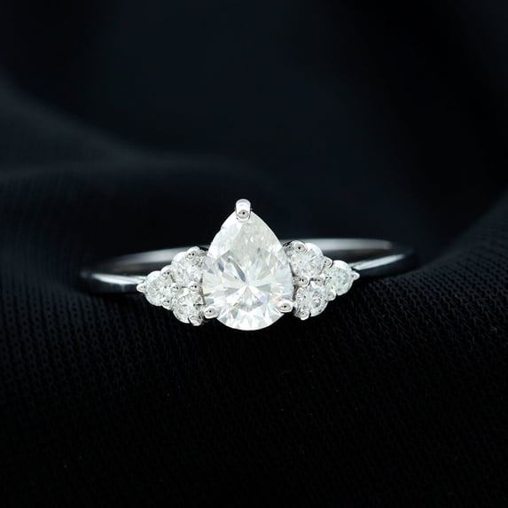 Kalapi Jewel Women’s Pear Cut 1.3 Ct Moissanite Solitaire Ring – Graceful 14K White Gold Plated Side Stone Engagement Ring with Prong Setting – Perfect Wedding Jewelry Gift