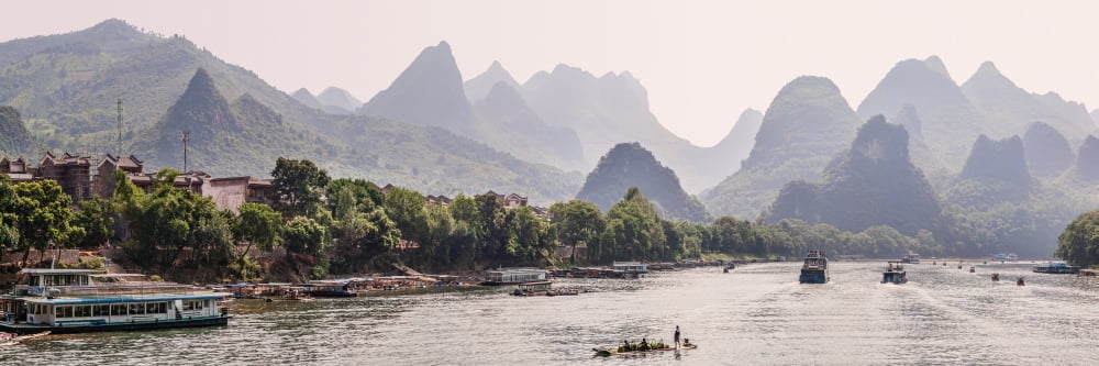 Karst landscape along the River Li Guilin Guangxi Zhuang Autonomous Region China Canvas Art - Panoramic Images (12 x 36)
