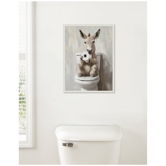 Kate and Laurel Cute Donkey Holding Toilet Paper Roll Toilet Bathroom Art Framed Canvas Wall Art by The Creative Bunch Studio 18 x 24 Sylvie Beaded White, Whimsical, Bathroom, Animals, Humor Art for