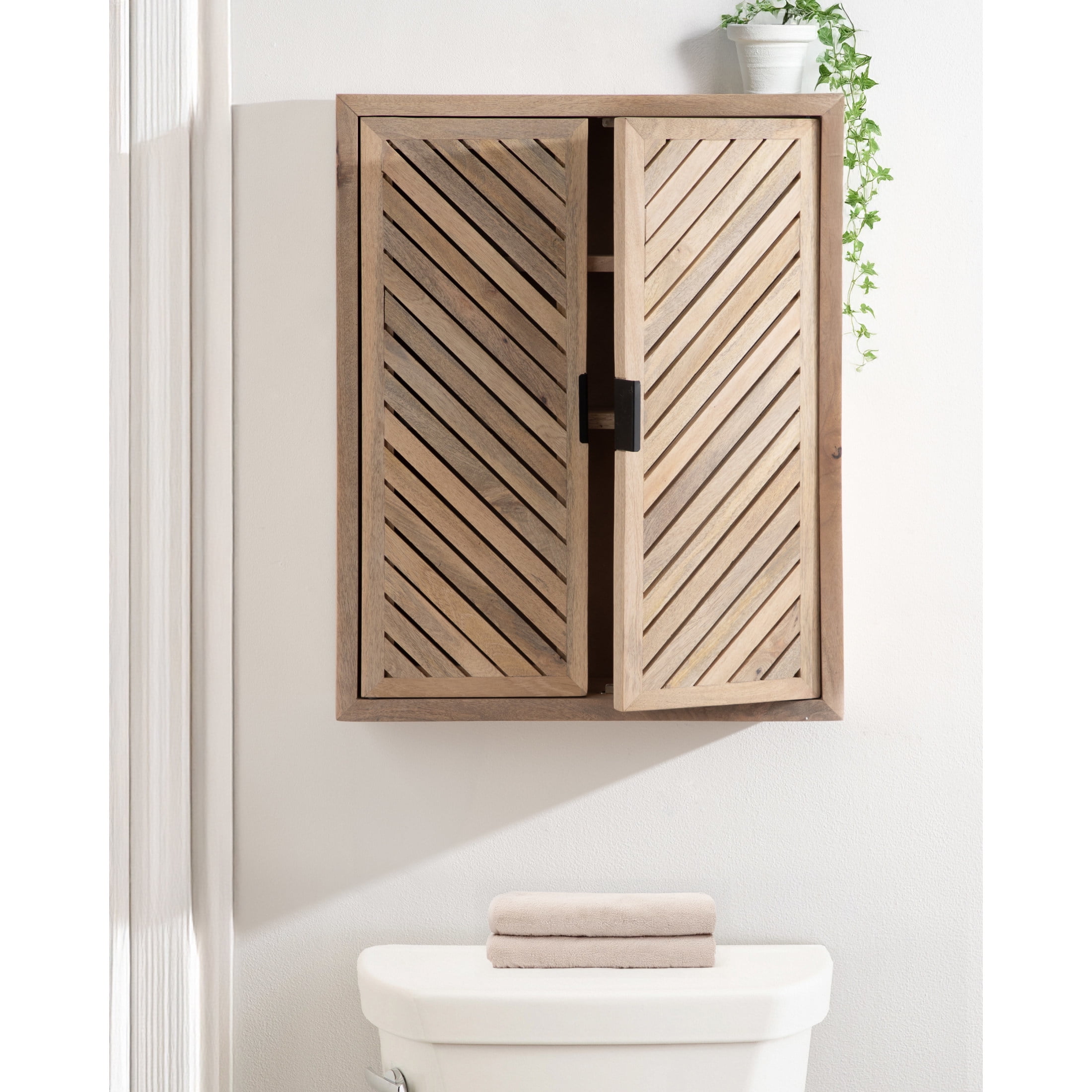 Kate and Laurel Mezzeta Decorative Modern Two-Door Floating Bathroom Cabinet, 22 x 7 x 28, Natural Wood, Decorative Solid Mango Wood Over the Toilet Storage Cabinet with Slatted Chevron Design