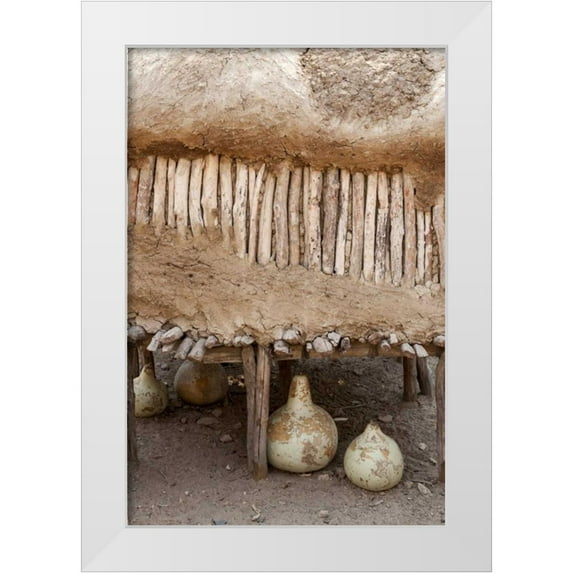 Kaveney, Wendy 11x14 White Modern Wood Framed Museum Art Print Titled - Namibia, Opuwo Gourds under food storage hut