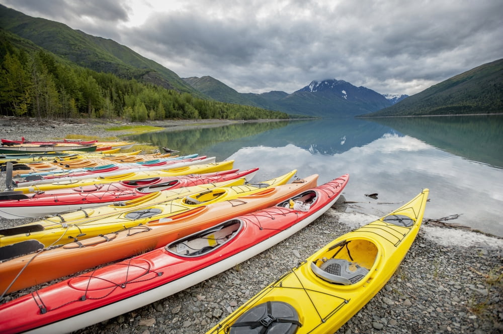 Kayaks in a row on shore at Eklutna Lake Chugach Mountains Southcentral Alaska Canvas Art - Remsberg Inc Design Pics (19 x 12)
