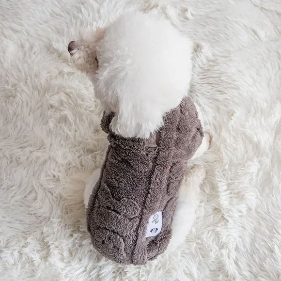Keep your furry friend warm and stylish with this cozy and chic pet sweater. Perfect for chilly days  this essential accessory will keep your pet snug and trendy. Dont wait  grab one now