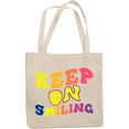thumbnail image 1 of Keep on Smiling, Motivational Quote, Groovy Retro Wavy Text Merch Gift, 12oz Canvas Tote Bag, 1 of 3